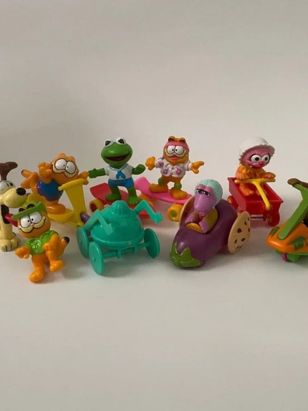 LOT OF vintage assorted McDONALD'S TOYS Yogi bear Garfield Odie Kermit Muppets